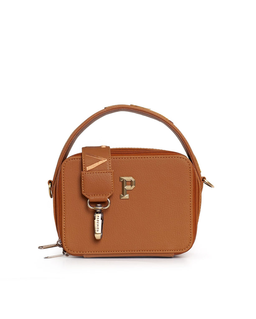 Petit Vibra Juicy cartera estructurada para mujer con cargadera ajustable en pvc con bolsillo interior en color  camel